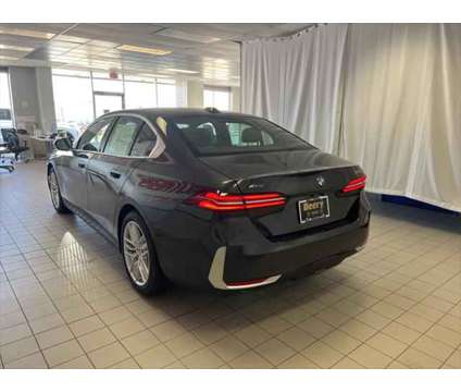 2024 BMW 5 Series i xDrive is a Grey 2024 BMW 5-Series Sedan in Dubuque IA