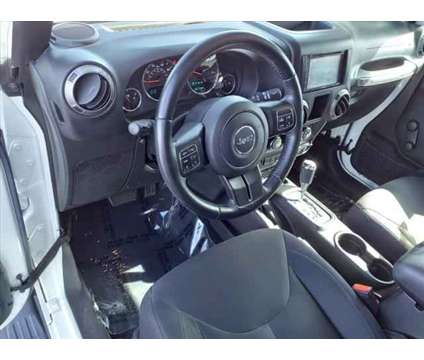 2015 Jeep Wrangler Unlimited Sport is a White 2015 Jeep Wrangler Unlimited Sport Car for Sale in Torrance CA