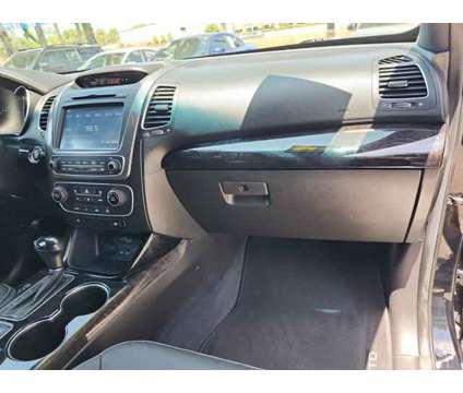 2014 Kia Sorento Limited V6 is a Black 2014 Kia Sorento Limited SUV in Deland FL