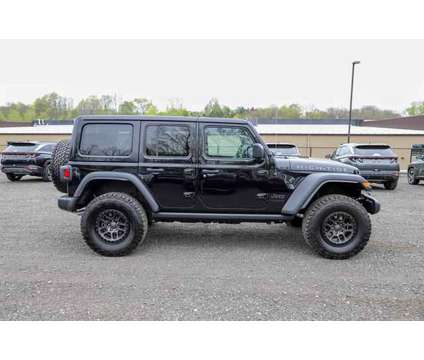 2022 Jeep Wrangler Unlimited High Tide 4x4 is a Black 2022 Jeep Wrangler Unlimited SUV in Beacon NY
