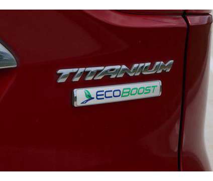 2015 Ford Escape Titanium is a Red 2015 Ford Escape Titanium SUV in Friendswood TX