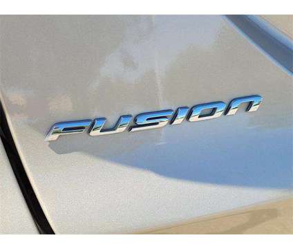 2017 Ford Fusion Hybrid SE is a Gold, White 2017 Ford Fusion Hybrid SE Hybrid in Folsom CA