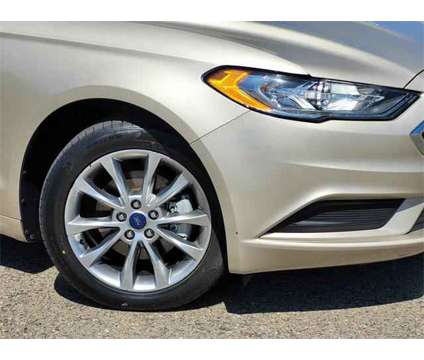 2017 Ford Fusion Hybrid SE is a Gold, White 2017 Ford Fusion Hybrid SE Hybrid in Folsom CA