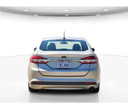 2017 Ford Fusion Hybrid SE is a Gold, White 2017 Ford Fusion Hybrid SE Hybrid in Folsom CA