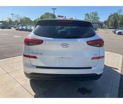 2019 Hyundai Tucson SE is a White 2019 Hyundai Tucson SE SUV in Lakewood NY