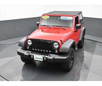 2015 Jeep Wrangler Willys Wheeler is a Red 2015 Jeep Wrangler SUV in Dubuque IA
