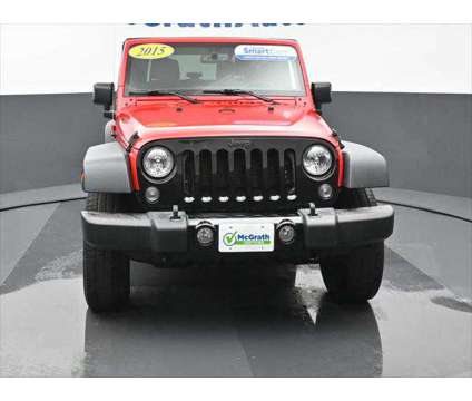 2015 Jeep Wrangler Willys Wheeler is a Red 2015 Jeep Wrangler SUV in Dubuque IA