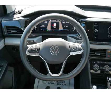 2022 Volkswagen Taos 1.5T SEL is a Grey, Silver 2022 SUV in Mankato MN