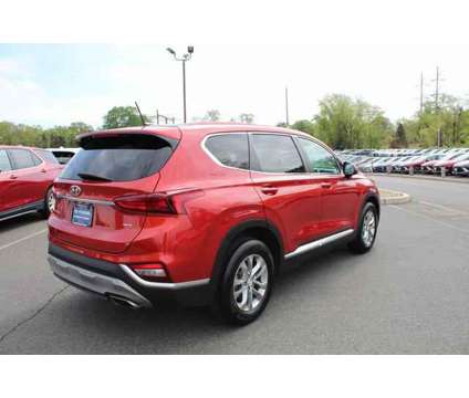 2020 Hyundai Santa Fe SE is a Orange 2020 Hyundai Santa Fe SE SUV in Shrewsbury NJ