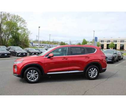 2020 Hyundai Santa Fe SE is a Orange 2020 Hyundai Santa Fe SE SUV in Shrewsbury NJ