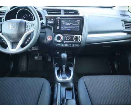 2018 Honda Fit EX is a Silver 2018 Honda Fit EX Hatchback in Friendswood TX