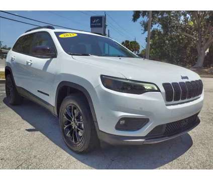 2023 Jeep Cherokee Altitude Lux 4x4 is a White 2023 Jeep Cherokee Altitude Car for Sale in Cocoa FL