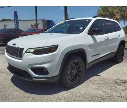 2023 Jeep Cherokee Altitude Lux 4x4 is a White 2023 Jeep Cherokee Altitude Car for Sale in Cocoa FL