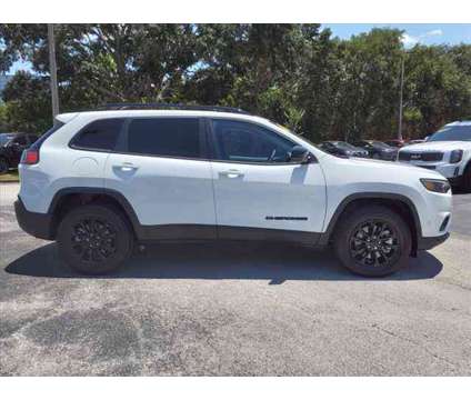 2023 Jeep Cherokee Altitude Lux 4x4 is a White 2023 Jeep Cherokee Altitude Car for Sale in Cocoa FL