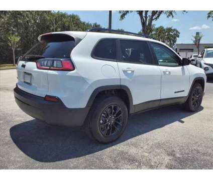 2023 Jeep Cherokee Altitude Lux 4x4 is a White 2023 Jeep Cherokee Altitude Car for Sale in Cocoa FL