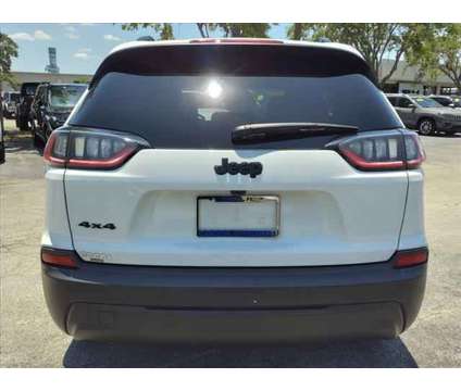 2023 Jeep Cherokee Altitude Lux 4x4 is a White 2023 Jeep Cherokee Altitude Car for Sale in Cocoa FL