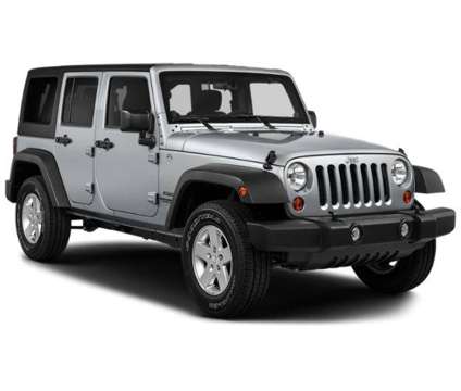 2018 Jeep Wrangler JK Unlimited Freedom Edition 4x4 is a Black 2018 Jeep Wrangler SUV in Raynham MA