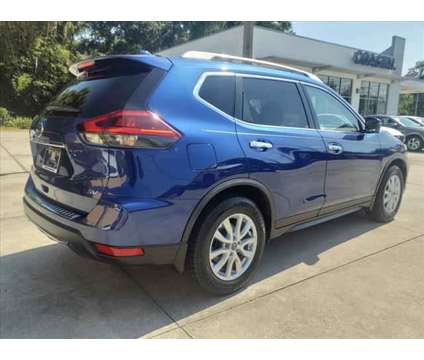 2018 Nissan Rogue SV is a Blue 2018 Nissan Rogue SV Car for Sale in Melbourne FL