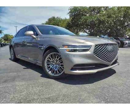2022 Genesis G90 5.0 Ultimate RWD is a Gold, Silver 2022 Genesis G90 5.0 Ultimate Car for Sale in Melbourne FL
