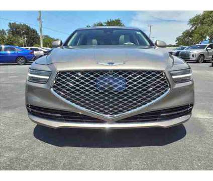 2022 Genesis G90 5.0 Ultimate RWD is a Gold, Silver 2022 Genesis G90 5.0 Ultimate Car for Sale in Melbourne FL