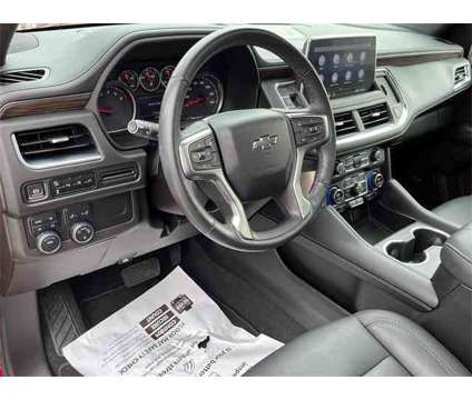 2021 Chevrolet Tahoe 4WD Z71 is a Red 2021 Chevrolet Tahoe 4WD SUV in Granbury TX