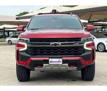 2021 Chevrolet Tahoe 4WD Z71 is a Red 2021 Chevrolet Tahoe 4WD SUV in Granbury TX