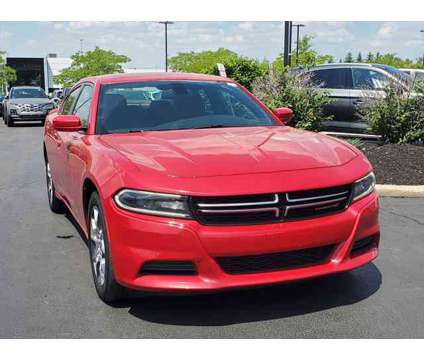 2016 Dodge Charger SE is a Red 2016 Dodge Charger SE Sedan in Brunswick OH