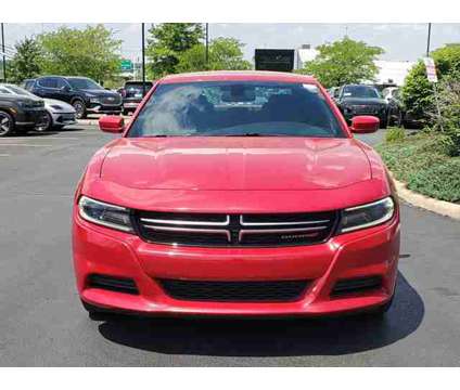 2016 Dodge Charger SE is a Red 2016 Dodge Charger SE Sedan in Brunswick OH