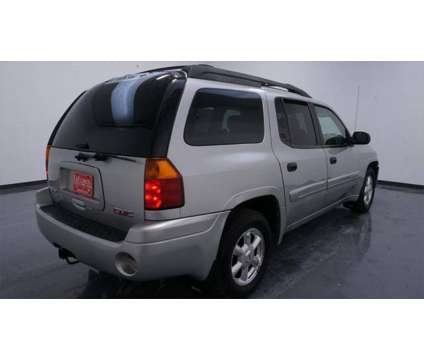 2004 GMC Envoy XL SLE is a Silver 2004 GMC Envoy XL SLE SUV in Waterloo IA