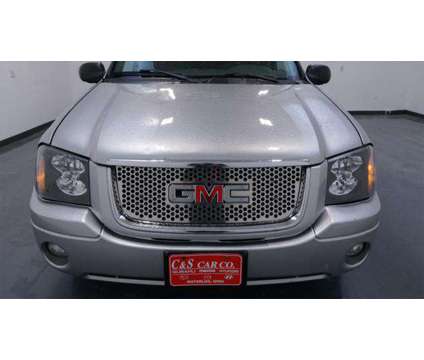 2004 GMC Envoy XL SLE is a Silver 2004 GMC Envoy XL SLE SUV in Waterloo IA