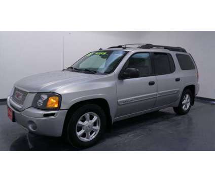 2004 GMC Envoy XL SLE is a Silver 2004 GMC Envoy XL SLE SUV in Waterloo IA