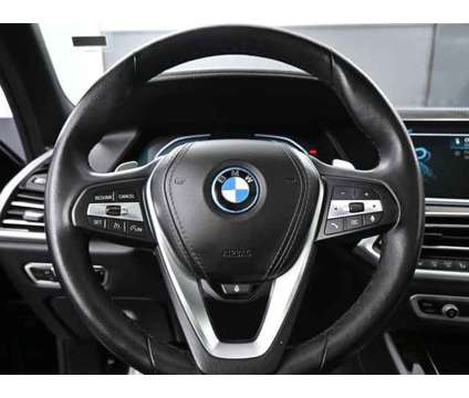 2023 BMW X5 xDrive45e is a Black 2023 BMW X5 4.6is SUV in Bartlett IL