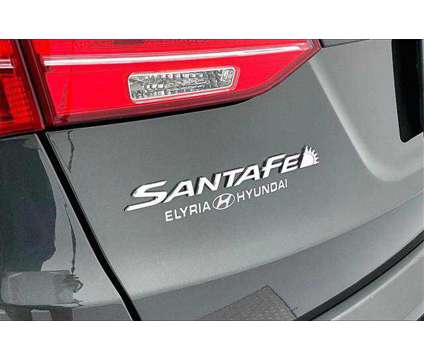 2014 Hyundai Santa Fe Sport 2.4L is a Green 2014 Hyundai Santa Fe Sport 2.4L SUV in Elyria OH