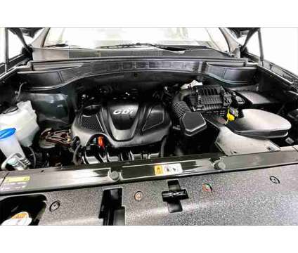 2014 Hyundai Santa Fe Sport 2.4L is a Green 2014 Hyundai Santa Fe Sport 2.4L SUV in Elyria OH