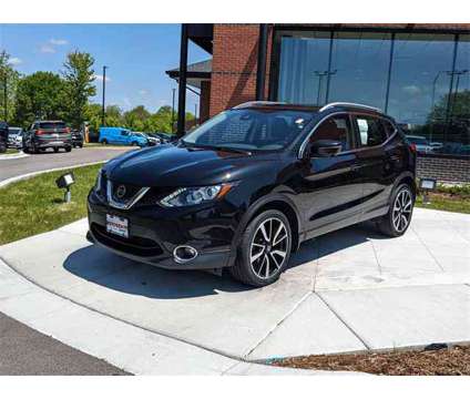 2017 Nissan Rogue Sport SL is a Black 2017 Nissan Rogue Station Wagon in Algonquin IL