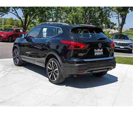 2017 Nissan Rogue Sport SL is a Black 2017 Nissan Rogue Station Wagon in Algonquin IL