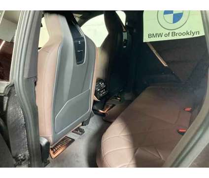 2025 BMW iX xDrive50 is a Black 2025 BMW 325 Model iX SUV in Brooklyn NY