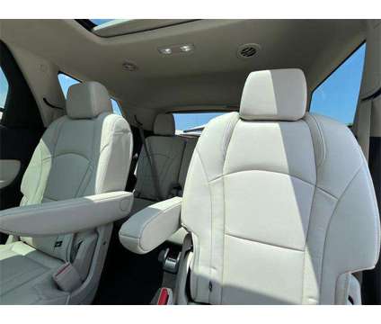 2024 Buick Enclave Essence FWD is a White 2024 Buick Enclave Essence SUV in Granbury TX