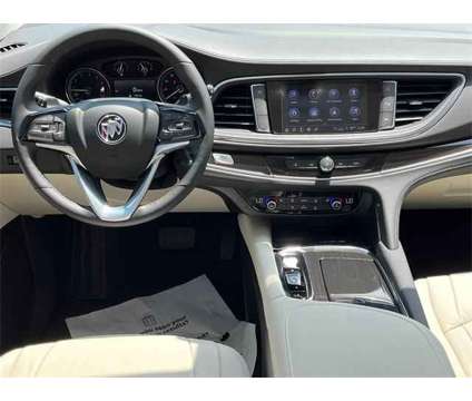 2024 Buick Enclave Essence FWD is a White 2024 Buick Enclave Essence SUV in Granbury TX