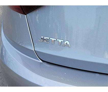 2021 Volkswagen Jetta 1.4T R-Line is a Grey, Silver 2021 Volkswagen Jetta 2.5 Trim Sedan in Mechanicsburg PA
