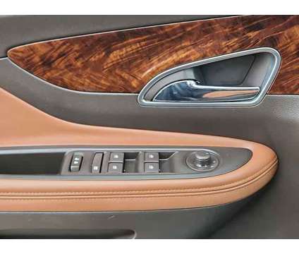 2014 Buick Encore Leather is a Brown 2014 Buick Encore Leather SUV in Pueblo CO