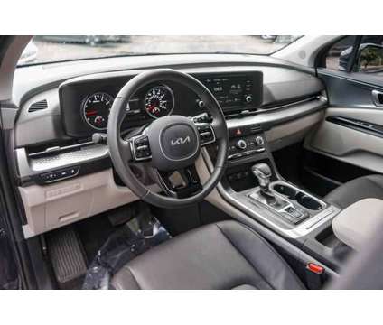 2024 Kia Carnival LX Seat Package is a Blue 2024 Van in Lindon UT