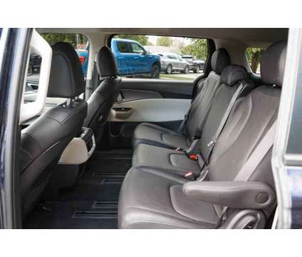 2024 Kia Carnival LX Seat Package is a Blue 2024 Van in Lindon UT