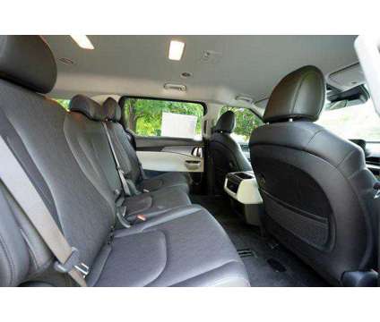 2024 Kia Carnival LX Seat Package is a Blue 2024 Van in Lindon UT