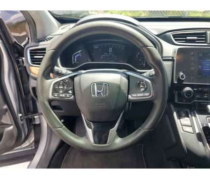 2020 Honda CR-V 2WD EX is a Silver 2020 Honda CR-V 2WD EX SUV in Orlando FL