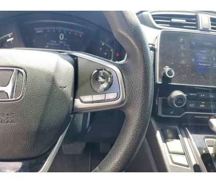 2020 Honda CR-V 2WD EX is a Silver 2020 Honda CR-V 2WD EX SUV in Orlando FL