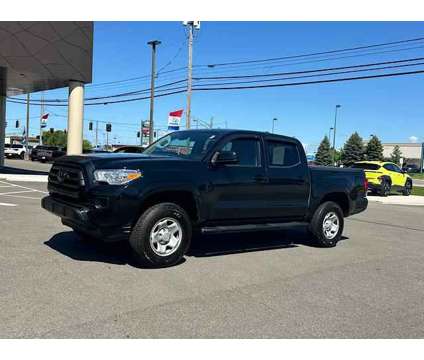 2021 Toyota Tacoma SR V6 is a Black 2021 Toyota Tacoma SR Truck in Marion OH