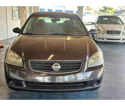 2006 Nissan Altima for sale is a Brown 2006 Nissan Altima 2.5 Trim Car for Sale in Haines City FL