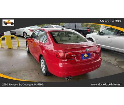 2012 Volkswagen Jetta for sale is a Red 2012 Volkswagen Jetta 2.5 Trim Car for Sale in Dubuque IA
