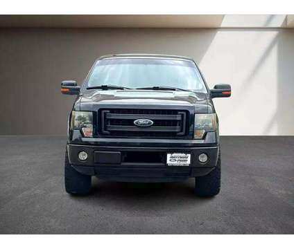 2013 Ford F150 SuperCrew Cab for sale is a Black 2013 Ford F-150 SuperCrew Car for Sale in Houston TX